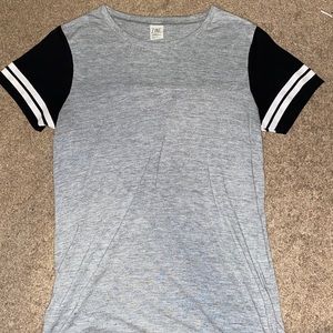 Grey tee with Black and white striped sleeve